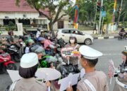 Tingkatkan Kesadaran Pengendara Dimasa Pilkada Riau 2024 Tim Cooling System Sampaikan Himbauan Di Traffic Light