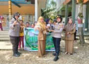 Sat Binmas Polres Rohul Tanamkan Cinta Lingkungan Sejak Dini di SD Raisalam Lewat Green Policing