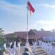 Polsek Tambusai Kawal Khidmat Upacara Penurunan Bendera HUT ke-81 RI