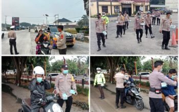 Kualitas Udara Memburuk, Polsek Tambusai Utara Bagikan Masker Gratis