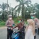Polsek Tambusai Tekan Risiko Paparan Kabut Asap, Bagikan 100 Masker